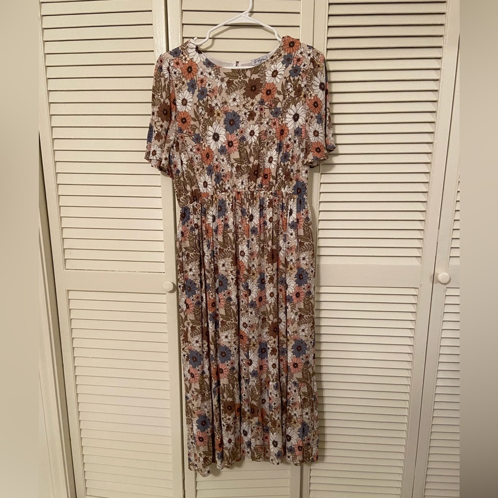 Never been worn. FERHNVI Tan flower print dress with slip